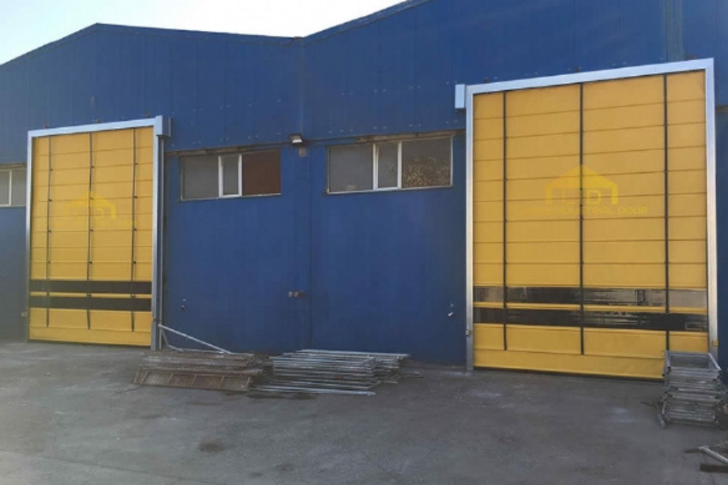 High speed folding doors